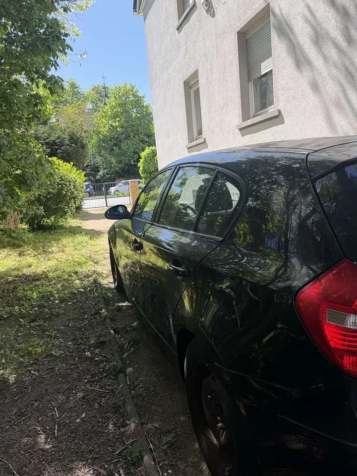 Second-hand BMW 116 122 CP (89 kW) 2007 Negru Hatchback