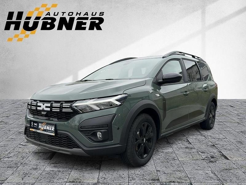 Grau Gebraucht 2023 Dacia Jogger Extreme Limousine | 22.890 € (Etwas zu teuer) - Bild 1/4