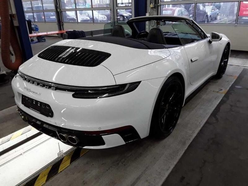 Gebraucht Porsche 992 450 PS (330 kW) 2021 Weiß carraraweißmetallic (metallic) Cabrio