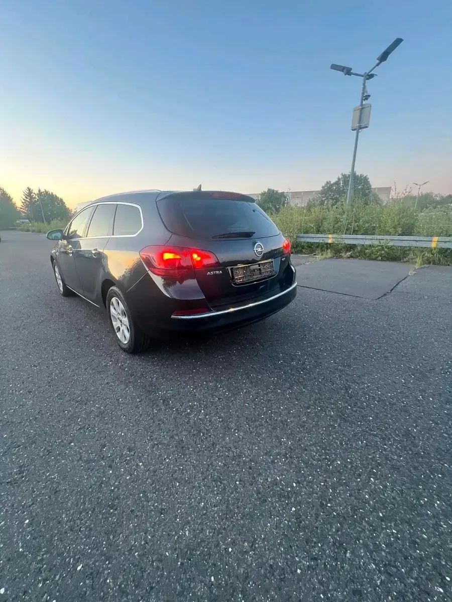 Gebraucht Opel Astra 110 PS (80 kW) 2016 Grün Kombi
