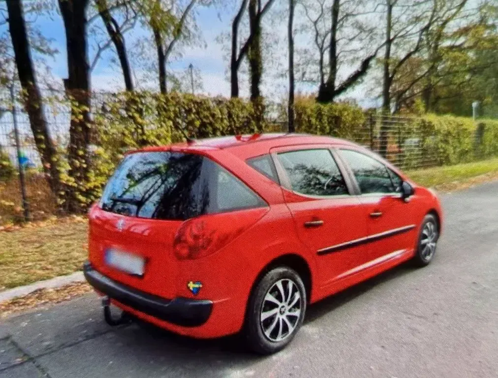 Gebraucht Peugeot 207 Premium 95 PS (69 kW) 2010 Rot Kombi