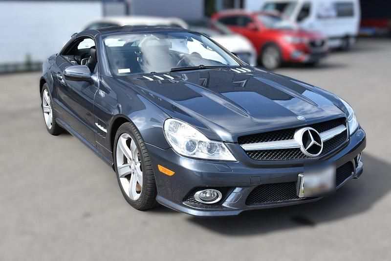 Grau Gebraucht 2009 Mercedes SL550 AMG Cabrio | 29.990 € - Bild 1/4