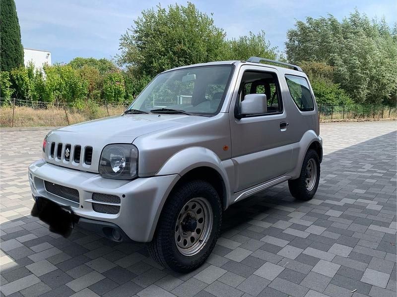 Silber Gebraucht 2010 Suzuki Jimny SUV | 12.990 € (Fairer Preis) - Bild 1/4