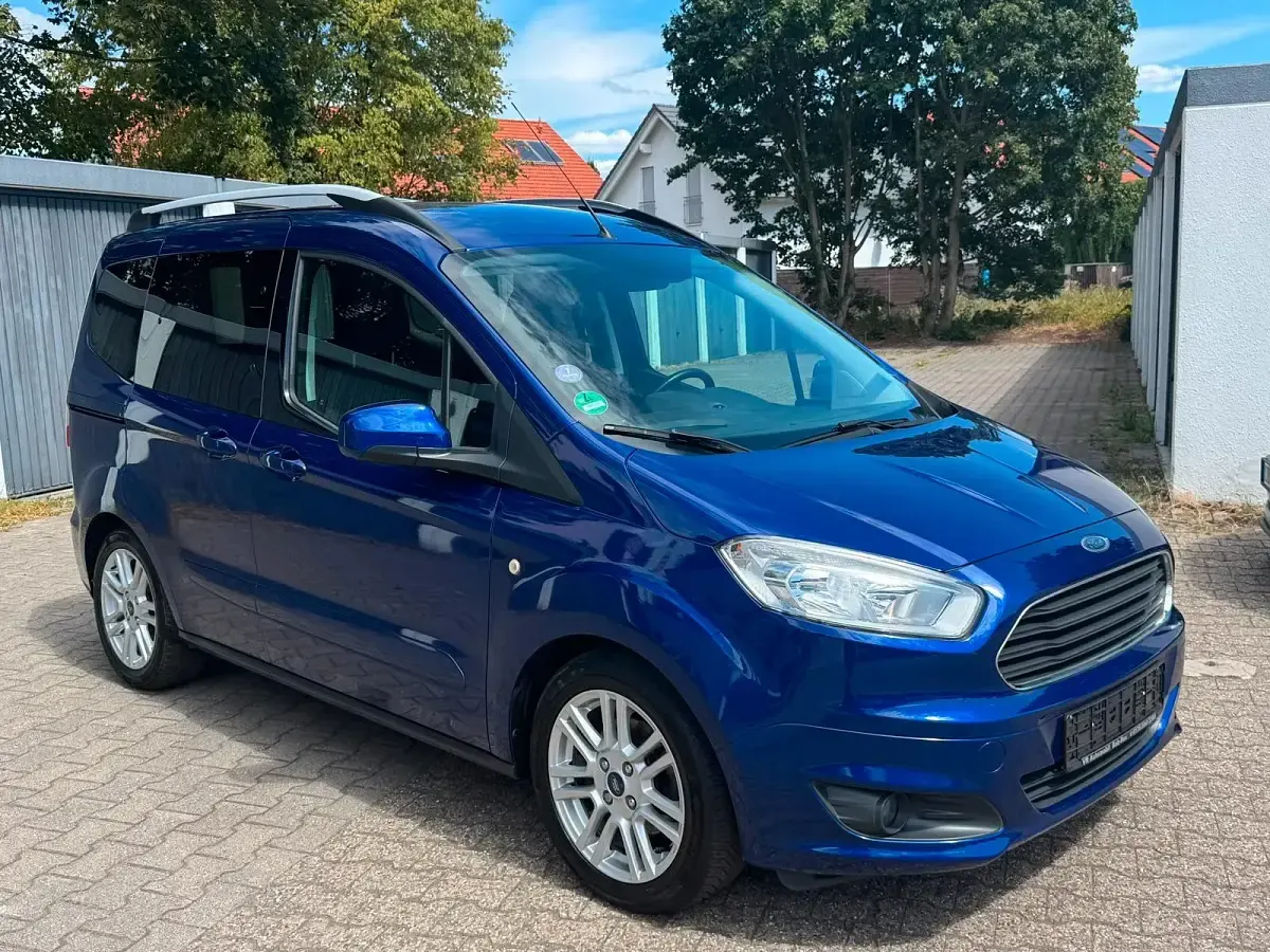 Gebraucht Ford Tourneo Courier 101 PS (74 kW) 2018 Blau Van / Kleinbus