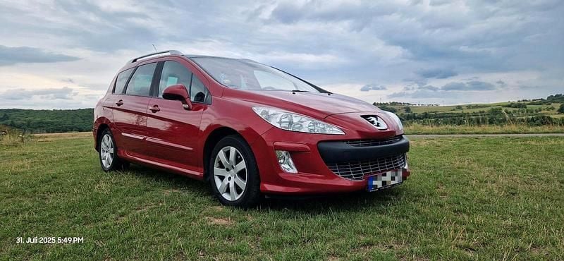 Rot Gebraucht 2011 Peugeot 308 Family Kombi | 2.500 € - Bild 1/4