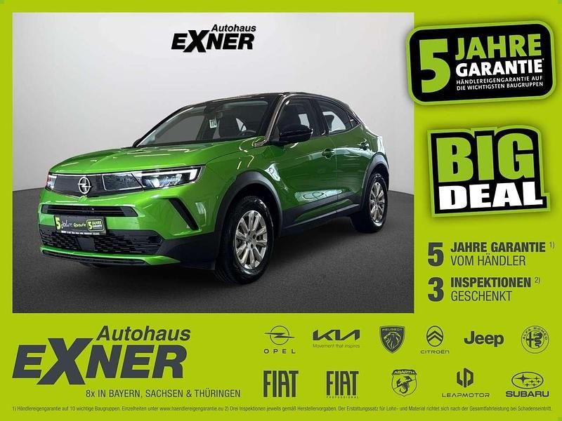 Matcha green / dach schwarz la Gebraucht 2022 Opel Mokka-e Edition SUV | 15.900 € (Superpreis) - Bild 1/4