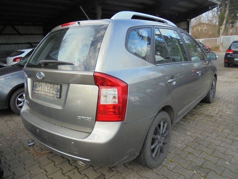 Używany Kia Carens 128 KM (94 kW) 2010 Szary Minivan