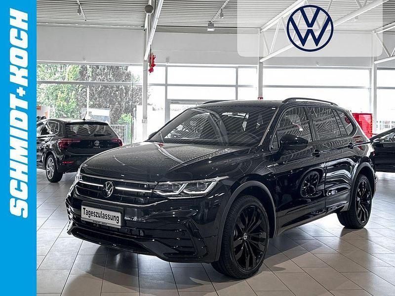 Schwarz Gebraucht 2024 VW Tiguan Allspace R-line SUV | 52.995 € - Bild 1/4