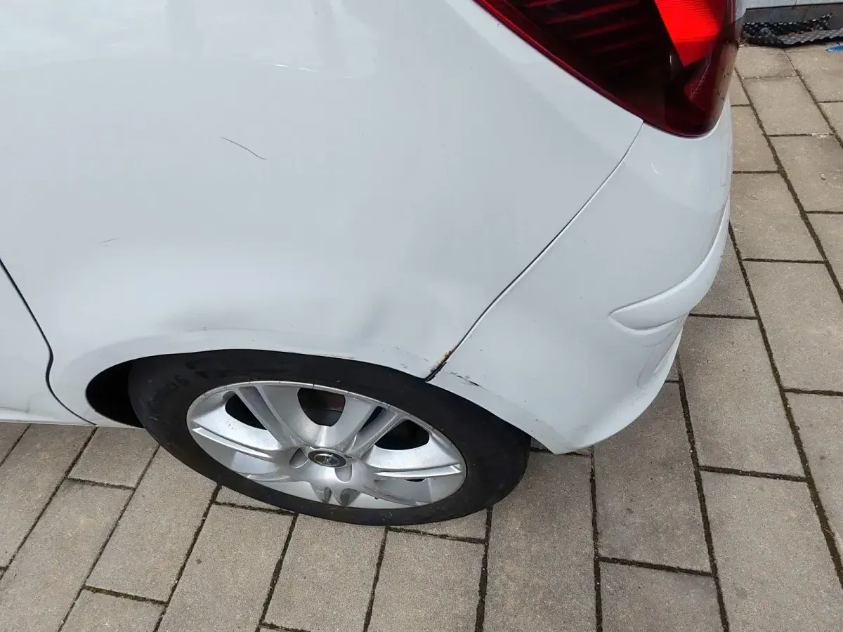 Używany Opel Corsa Edition 101 KM (74 kW) 2012 Biały Hatchback