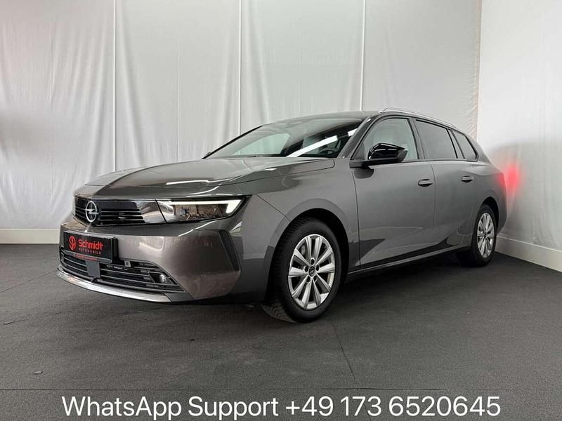 Grau/typ aussenverkleidung met Gebraucht 2023 Opel Astra Elegance Kombi | 16.890 € (Fairer Preis) - Bild 1/4