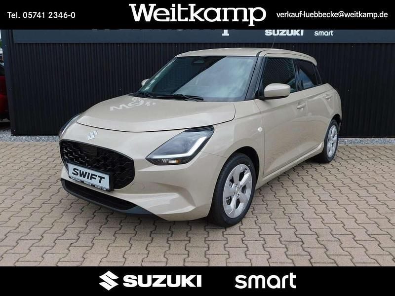 Caravan ivory Gebraucht 2024 Suzuki Swift Comfort Kleinwagen | 16.990 € (Fairer Preis) - Bild 1/4