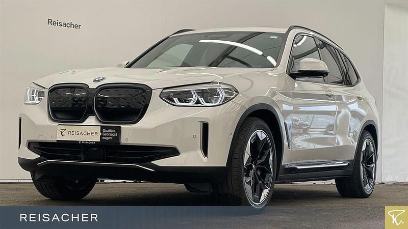 Mineralweiß metallic Gebraucht 2021 BMW iX3 Impressive SUV | 32.880 € (Superpreis) - Bild 1/4