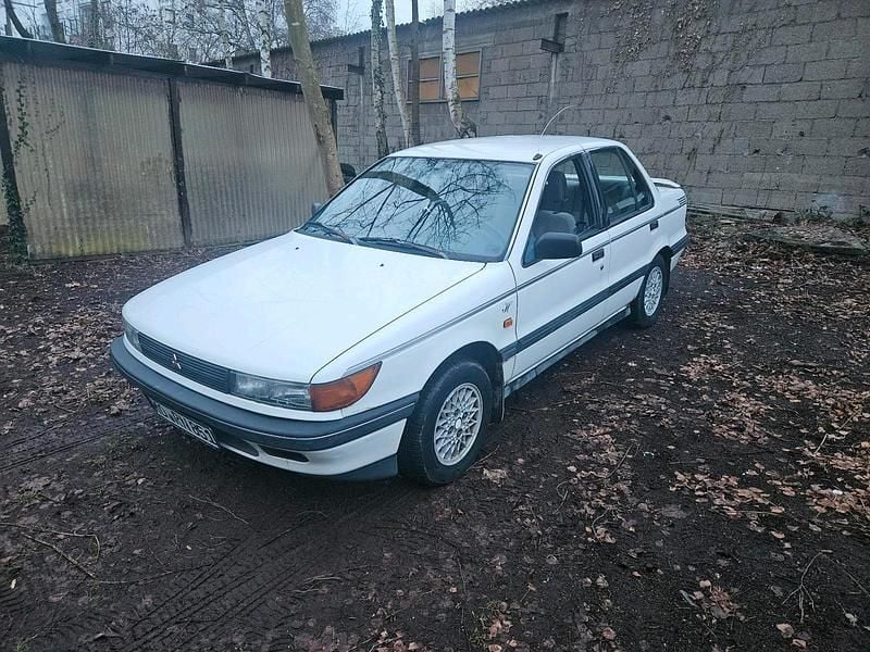 Weiß Gebraucht 1991 Mitsubishi Lancer Limousine | 1.200 € - Bild 1/4