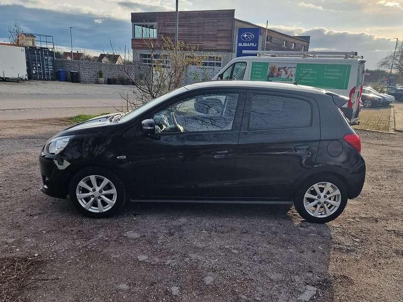 Second-hand Mitsubishi Space Star Top 80 CP (58 kW) 2014 Negru Hatchback