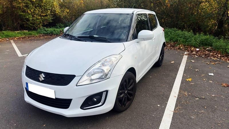 Weiß Gebraucht 2016 Suzuki Swift Kleinwagen | 8.200 € (Fairer Preis) - Bild 1/4