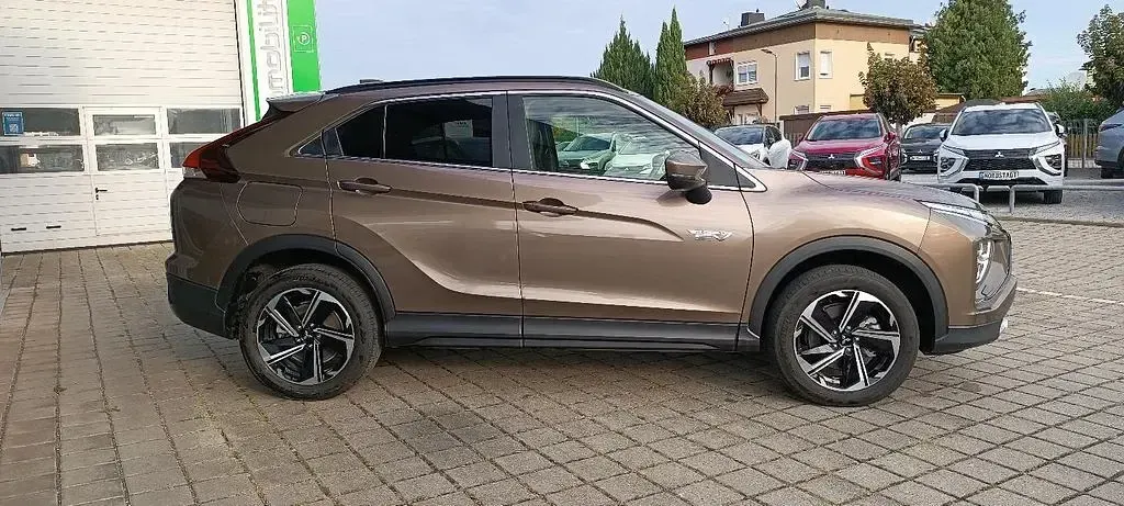 Gebraucht Mitsubishi Eclipse Cross Plus 188 PS (138 kW) 2024 Braun SUV