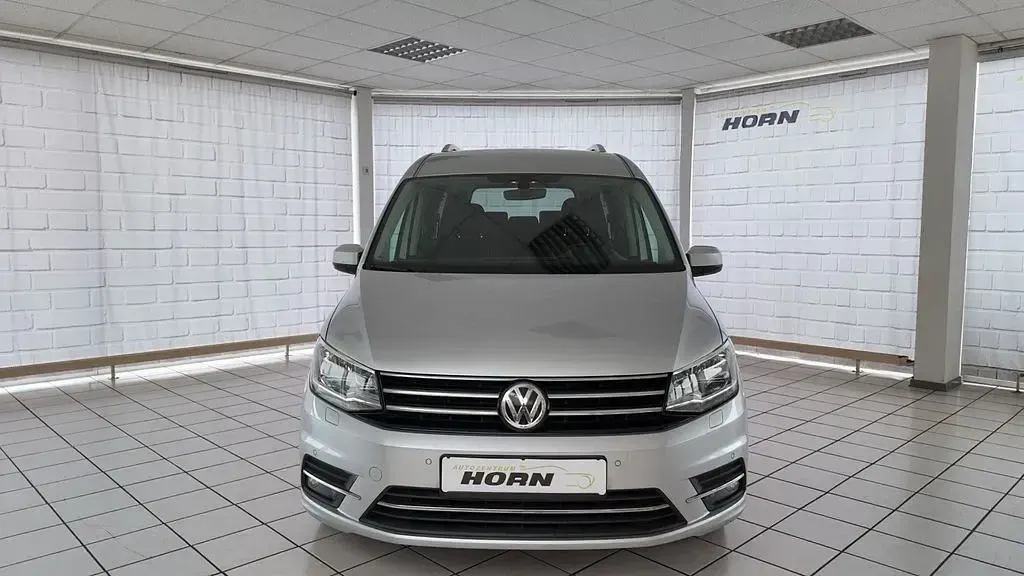 Używany VW Caddy Maxi Highline 102 KM (75 kW) 2015 Srebrny Minivan