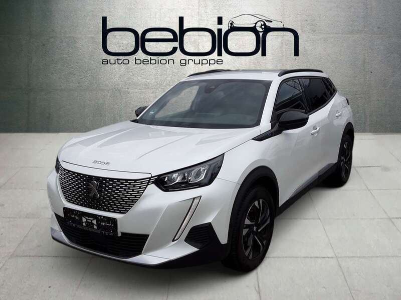 Lack weiss perlglänzend/typ au Gebraucht 2023 Peugeot e-2008 Allure SUV | 19.900 € (Superpreis) - Bild 1/4