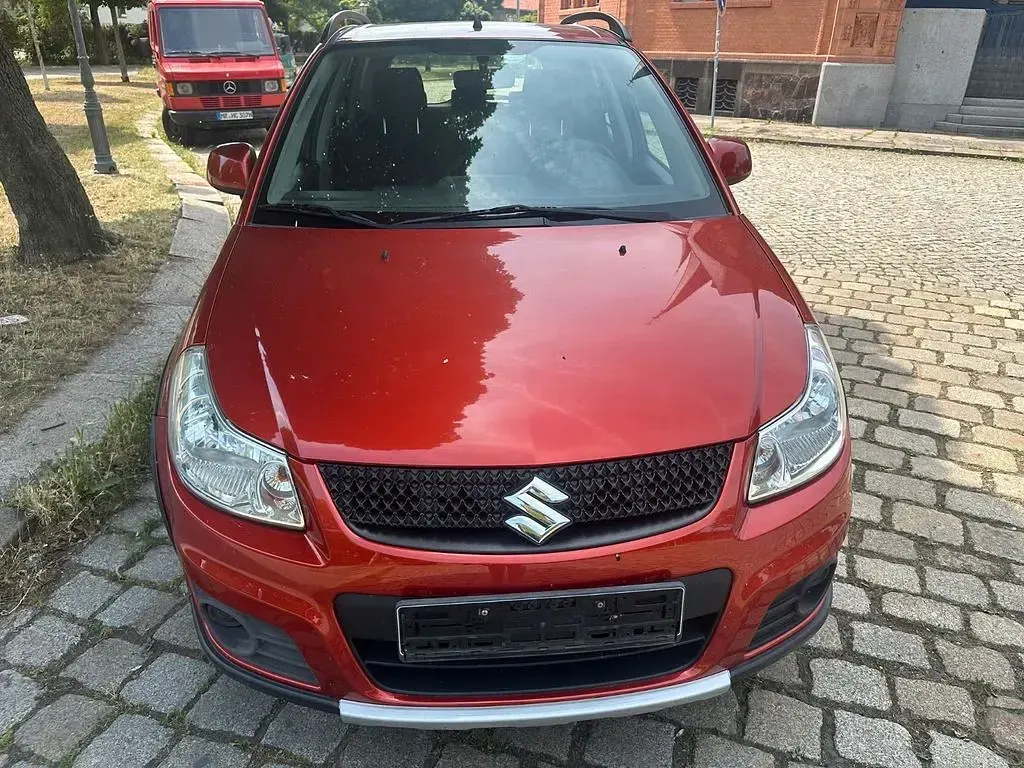Gebraucht Suzuki SX4 120 PS (88 kW) 2009 Orange Limousine
