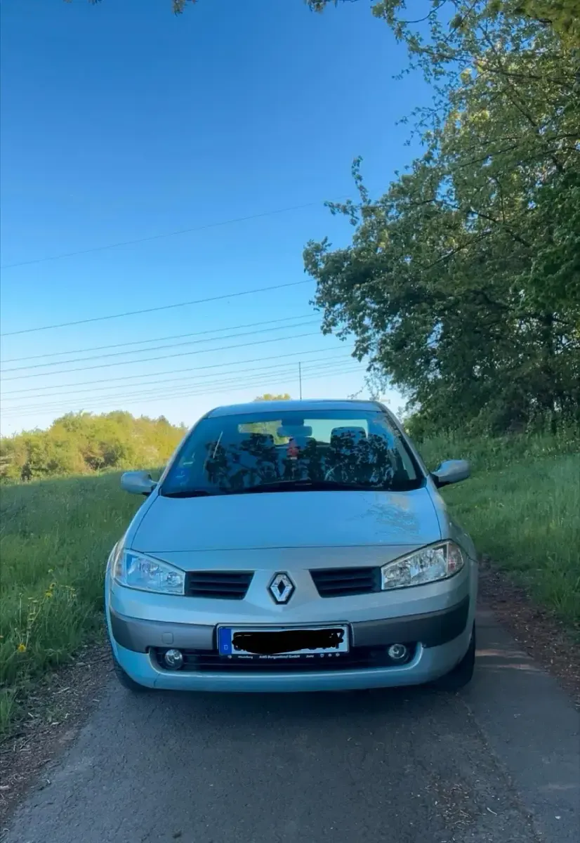 Używany Renault Mégane II 113 KM (83 kW) 2004 Srebrny Sedan/Limuzyna