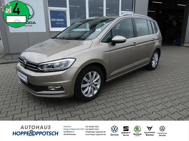 Titaniumbeige Gebraucht 2016 VW Touran Highline Van / Kleinbus | 20.495 € (Superpreis) - Bild 1/4