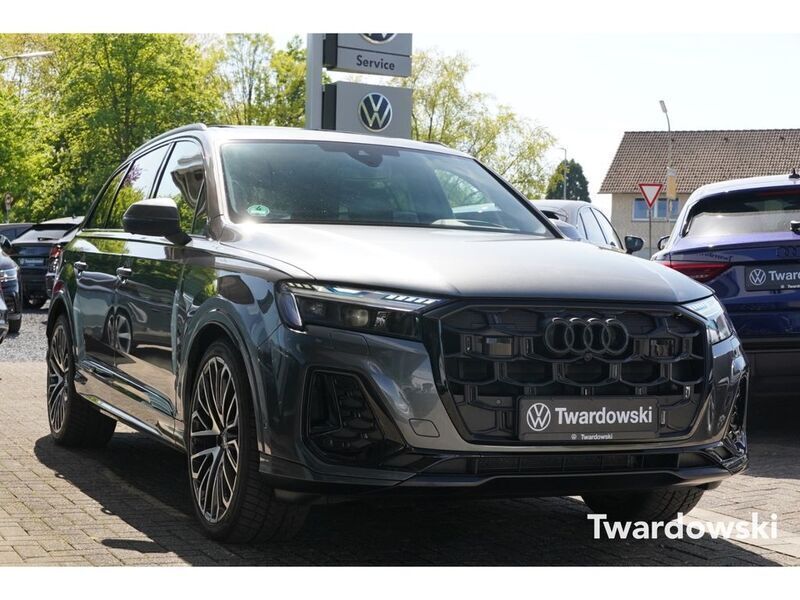 Grau Gebraucht 2024 Audi Q7 S-Line SUV | 93.990 € - Bild 1/4