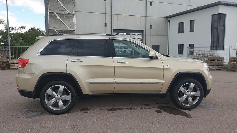 Gebraucht Jeep Grand Cherokee Overland 241 PS (177 kW) 2011 Gold SUV