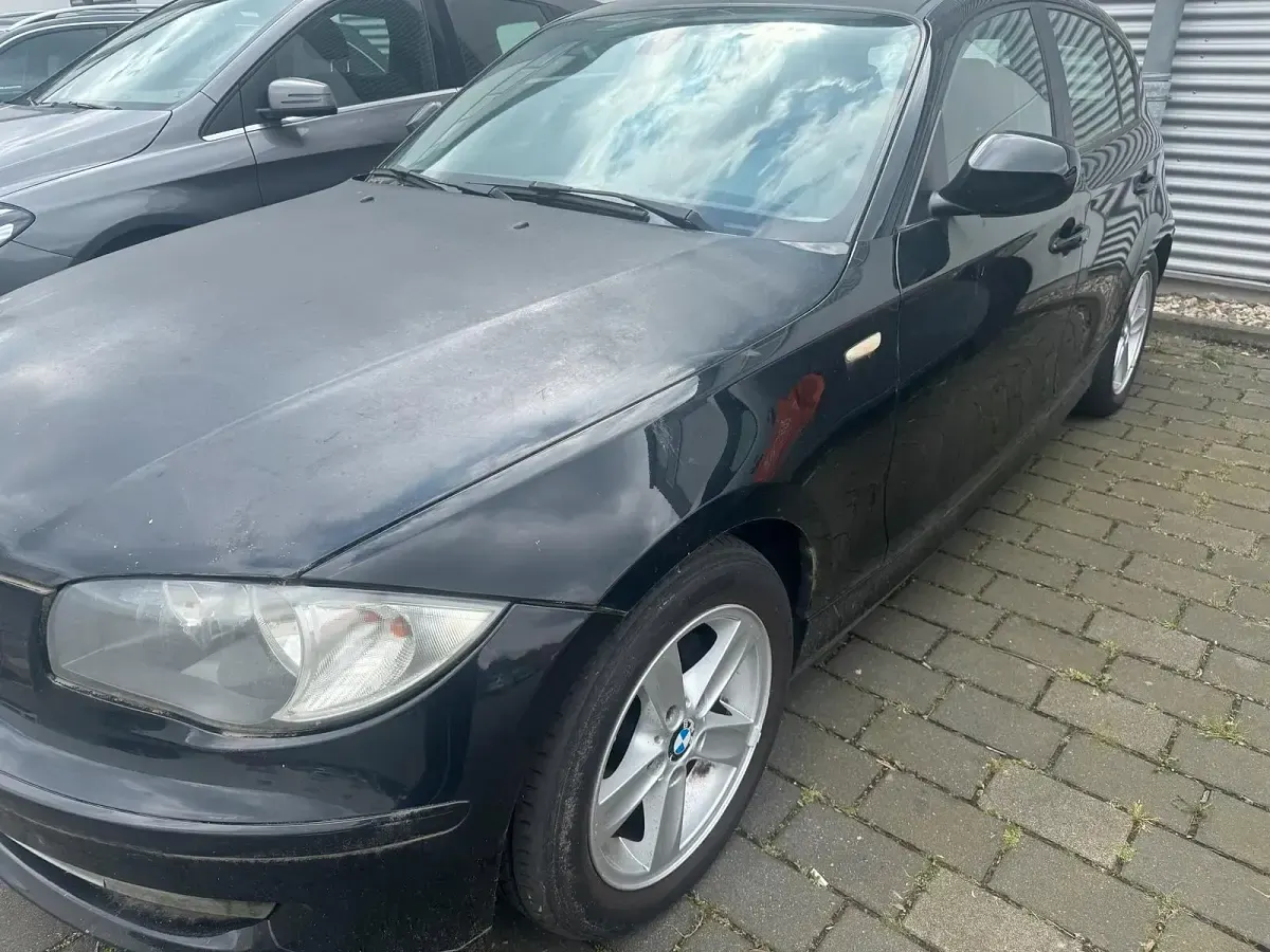 Gebraucht BMW 116 116 PS (85 kW) 2009 Schwarz Kleinwagen