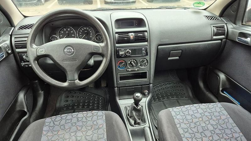 Second-hand Opel Astra 75 CP (55 kW) 1999 Roșu Berlinǎ