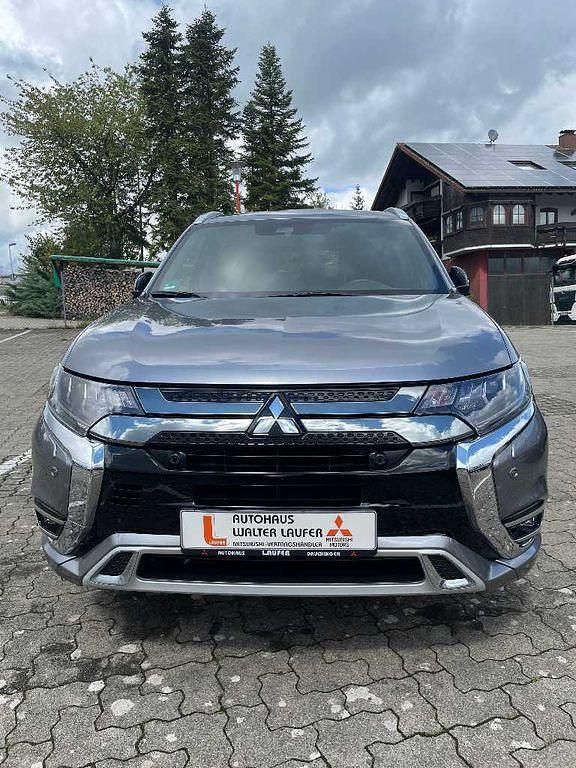 Platinumgrau Gebraucht 2020 Mitsubishi Outlander P-HEV Top SUV | 24.990 € (Guter Preis) - Bild 1/4