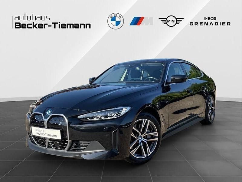 Saphirschwarz Gebraucht 2024 BMW i4 Efficient Dynamics Limousine | 39.899 € (Superpreis) - Bild 1/4