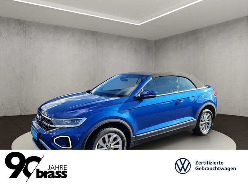 Gebraucht VW T-Roc Cabriolet Style 150 PS (110 kW) 2024 Ravennablau metallic/schwarz Cabrio