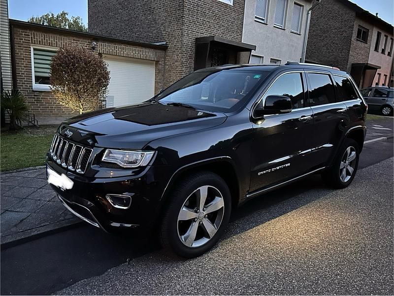 Schwarz Gebraucht 2015 Jeep Grand Cherokee Overland SUV | 12.100 € - Bild 1/4
