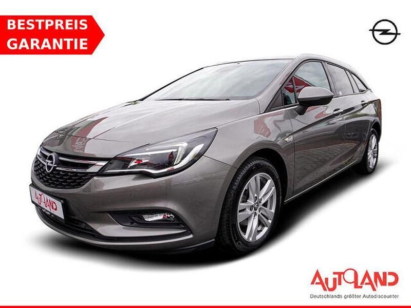 Grau Gebraucht 2017 Opel Astra Kombi | 14.950 € - Bild 1/4