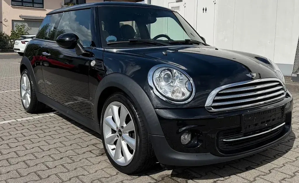 Gebraucht Mini Cooper 122 PS (89 kW) 2013 Midnight black metallic Kleinwagen
