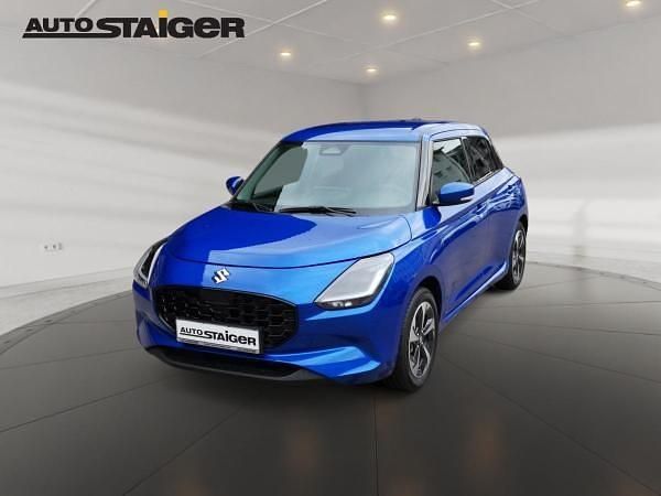 Blau Gebraucht 2024 Suzuki Swift Comfort+ Kleinwagen | 21.890 € (Teuer) - Bild 1/4
