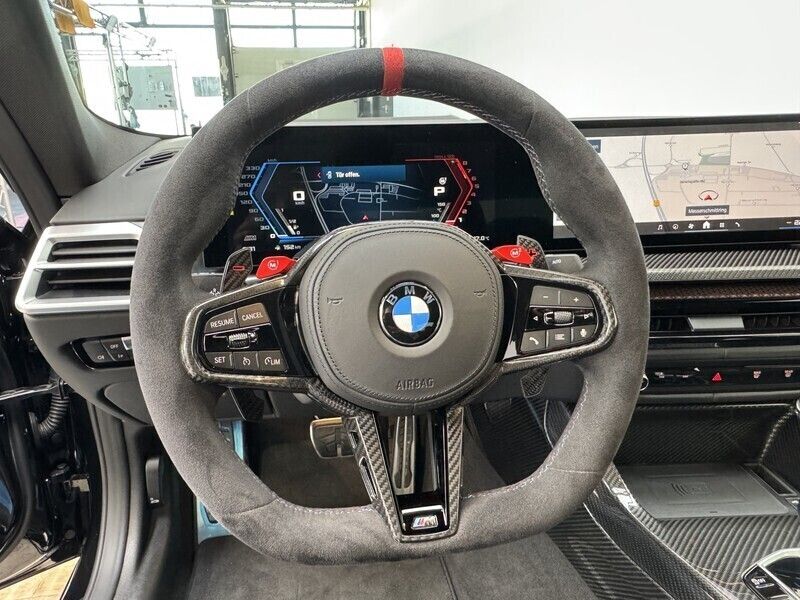 Saphirschwarz Gebraucht 2024 BMW M4 Shadowline Coupé | 126.989 € - Bild 1/4