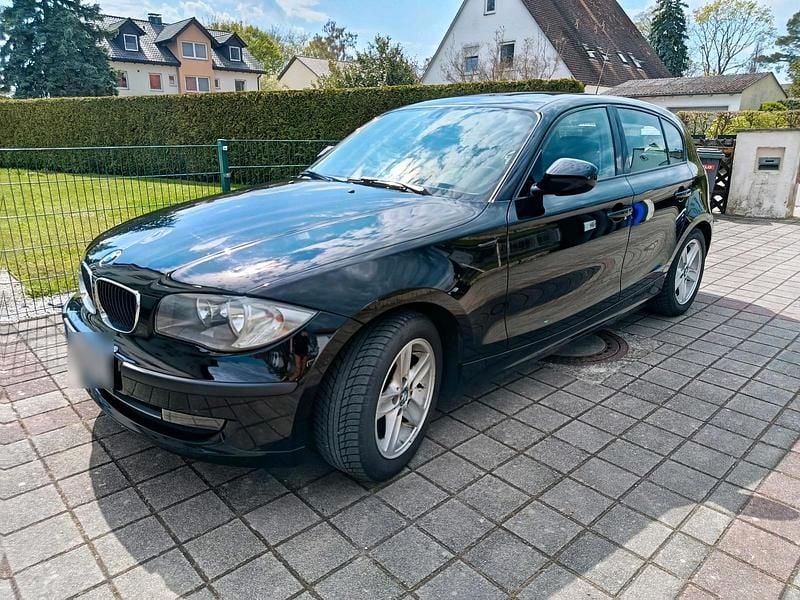 Second-hand BMW 116 122 CP (89 kW) 2010 Negru Hatchback