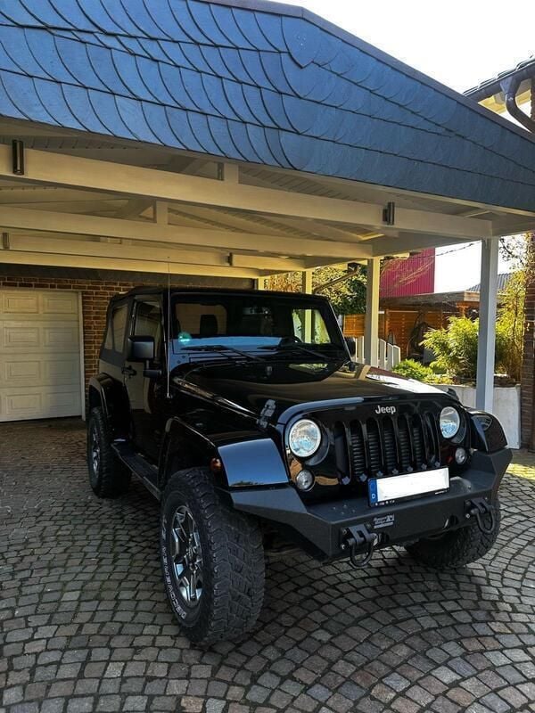 Schwarz Gebraucht 2015 Jeep Wrangler Sahara SUV | 35.000 € (Fairer Preis) - Bild 1/4