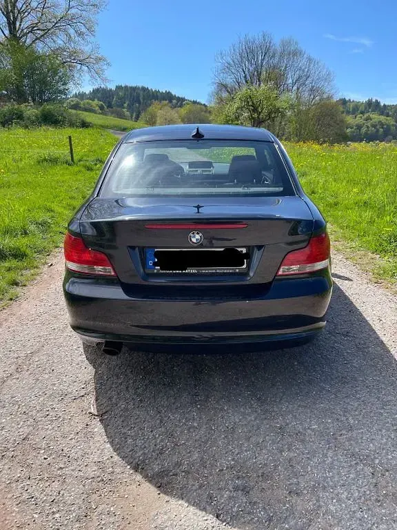 Second-hand BMW 123 Performance 204 CP (150 kW) 2009 Negru Hatchback