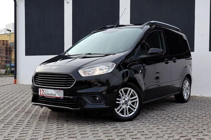 Schwarz Gebraucht 2022 Ford Tourneo Courier Titanium Van / Kleinbus | 14.400 € (Fairer Preis) - Bild 1/4