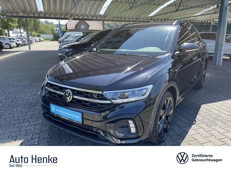 Deep black perleffekt (metallic) Gebraucht 2024 VW T-Roc Style SUV | 29.995 € (Etwas zu teuer) - Bild 1/4