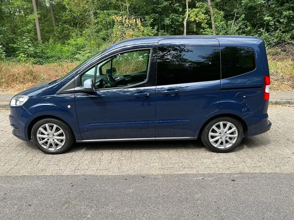Gebraucht Ford Tourneo Courier Trend 101 PS (74 kW) 2016 Blau Van / Kleinbus