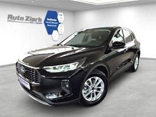 Obsidianschwarz metallic Gebraucht 2024 Ford Kuga Titanium SUV | 28.990 € (Fairer Preis) - Bild 1/4