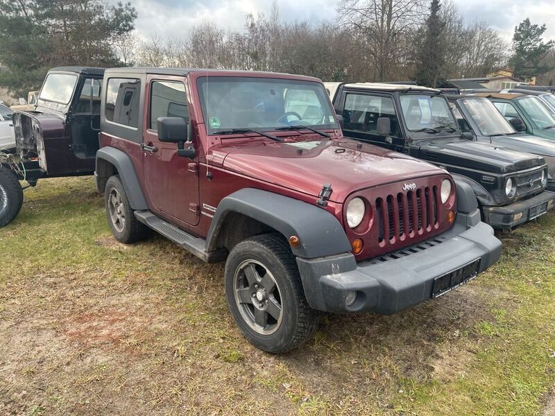 Rot Gebraucht 2009 Jeep Wrangler Sport SUV | 17.785 € (Etwas zu teuer) - Bild 1/4