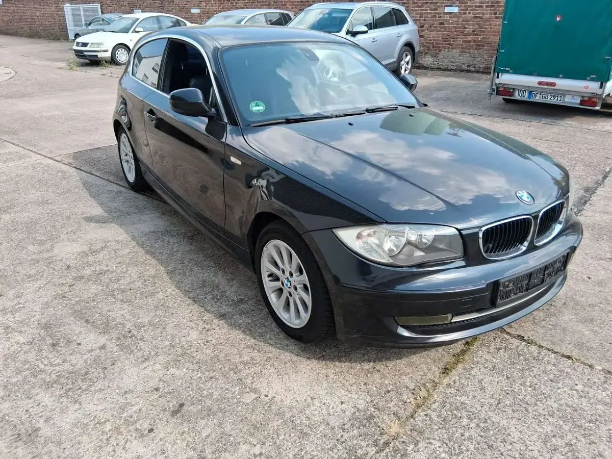 Używany BMW 116 Performance 122 KM (89 kW) 2010 Czarny Hatchback