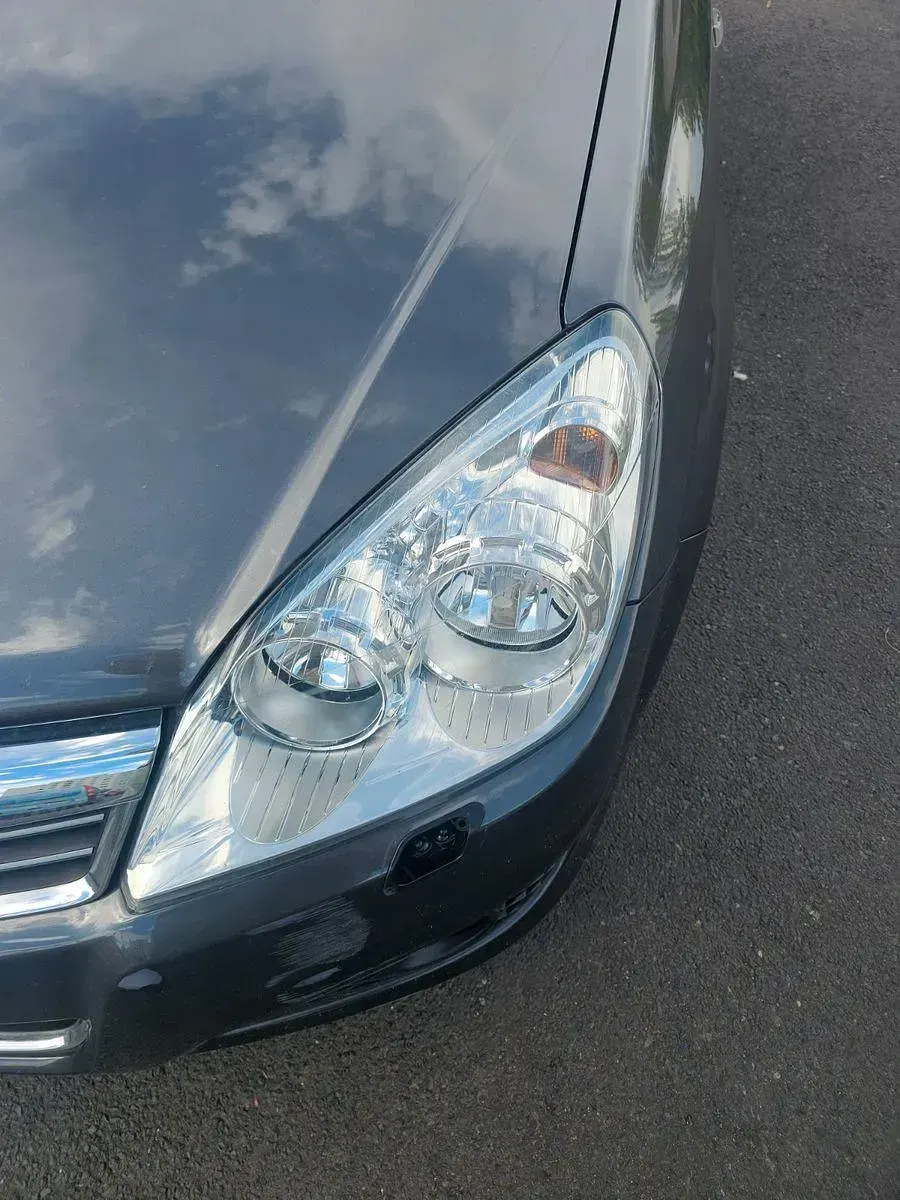 Używany Opel Astra Cosmo 116 KM (85 kW) 2009 Czarny Sedan/Limuzyna