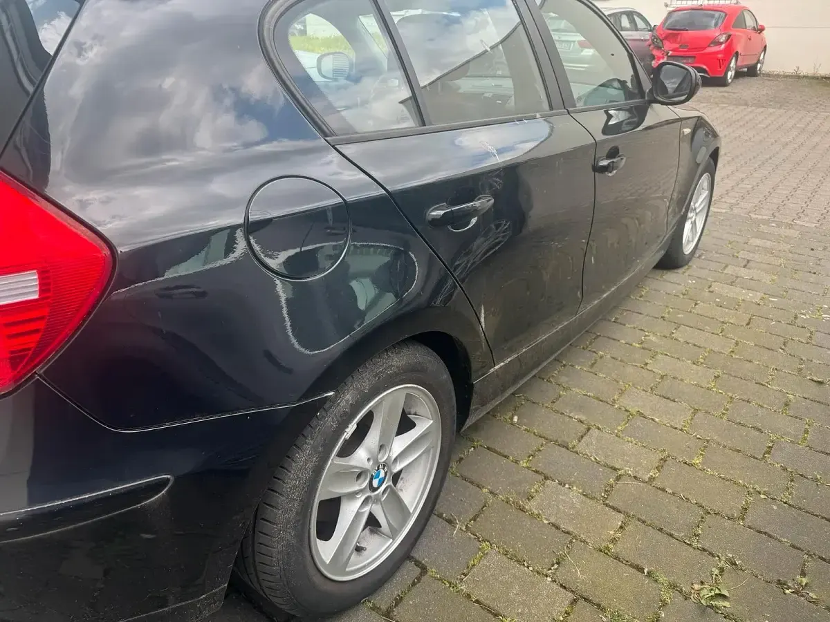 Gebraucht BMW 116 116 PS (85 kW) 2009 Schwarz Kleinwagen