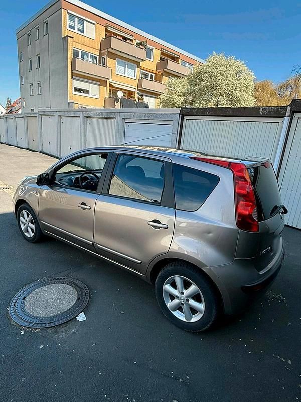Second-hand Nissan Note 110 CP (80 kW) 2007 Auriu Hatchback