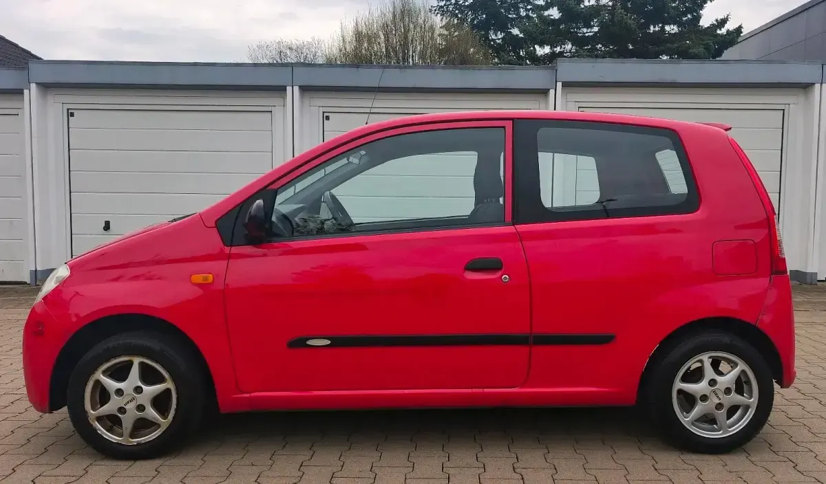 Gebraucht Daihatsu Cuore 58 PS (42 kW) 2005 Rot Kleinwagen